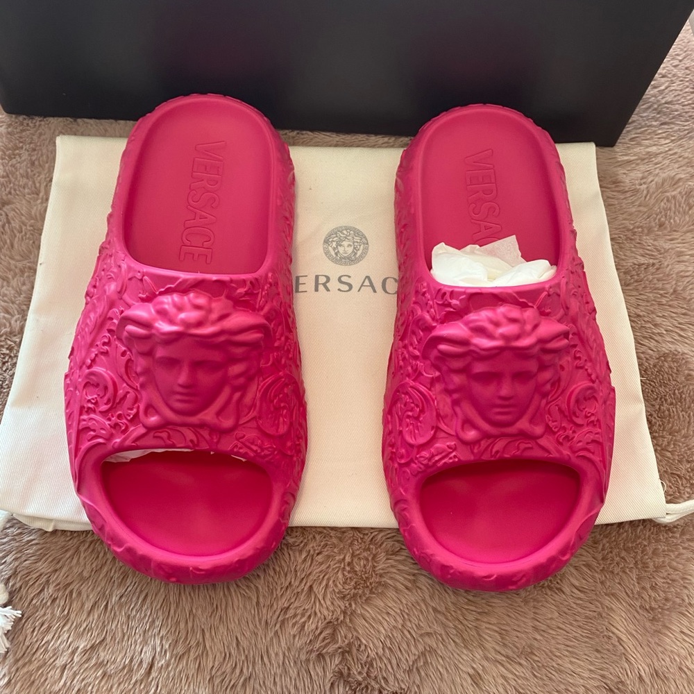 Pink Versace medusa slides